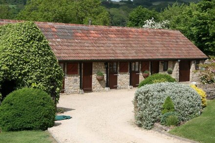 Spectacular luxury barn conversion overlooking a hidden valley near ba