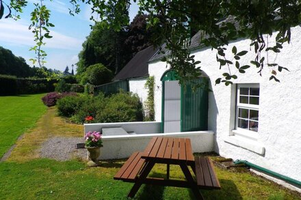 Cottage beside Loch Ness, Caledonian Canal and River Oich, Fort Augustus