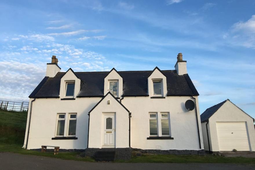 Traditional Croft House, modern interior, in stunning landscape, near the coast.