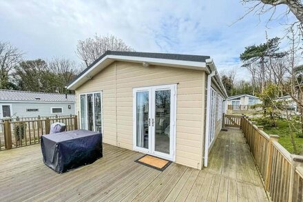 Lodge with decking and sea views at Azure Seas Park in Suffolk ref 32212OG