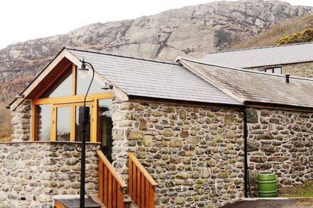 A Sea and Mountain Panorama from this charming stone barn