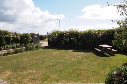 Beach front location, Pet friendly, Full of charachter, Private garden, Sea view