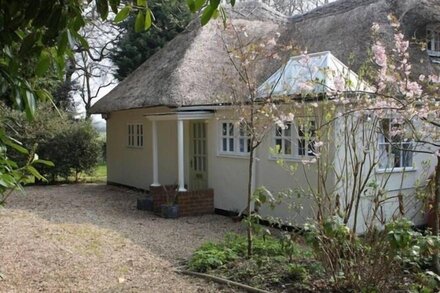 Cedar-tiled  Cottage in own Garden, in Grounds of Nearby Owner's House