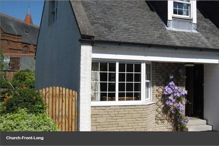 Church Cottage near to sandy beaches, town, garden, private parking and garden