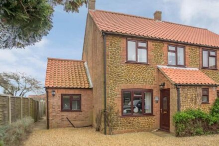 A beautifully presented four-bedroom holiday home near Holme Beach.