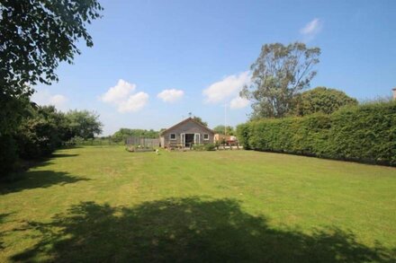 An outstanding 2 bedroom cottage on the golf course.