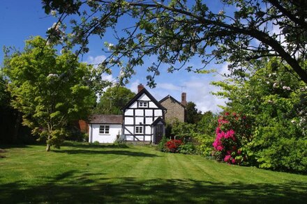 Picturesque Black And White Cottage