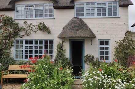 Beautiful mid century thatched cottage in the prettiest part of Winterton-on-Sea