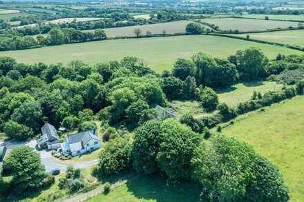 A quirky converted barn tucked away by the woods..