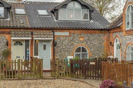 Coach House Cottage is a bijou brick and flint, semi-detached cottage offering lovely accommodation