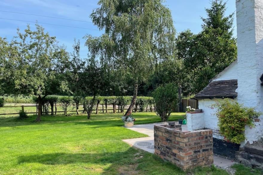 Semi-detached cottage set on the banks of the River Severn near to Ironbridge