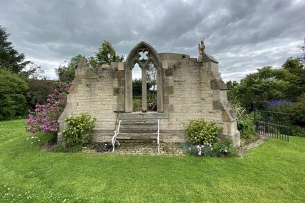 Beautiful lodge set in a magical garden with folly