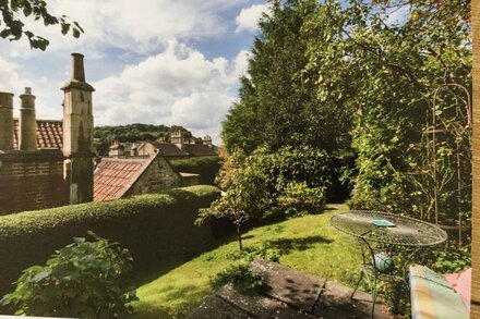 Charming 16th century house and garden, tranquil setting close to centre of city