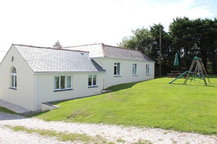 Spacious farmhouse with large childrens play area and fabulous family kitchen.