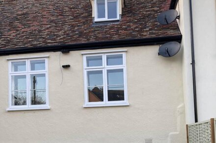 Grade II listed cottage, with parking, walk to town