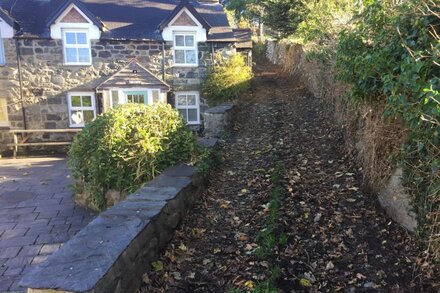 A fabulous stone cottage built in 1855, nestled in to the the hillside