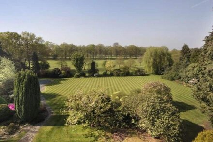 Elegant family home backing into a Golf Course .