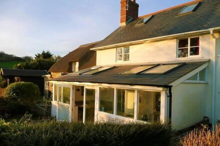 Stunning sea views, log burner,  modern kitchen,  just 15 mins walk to beach