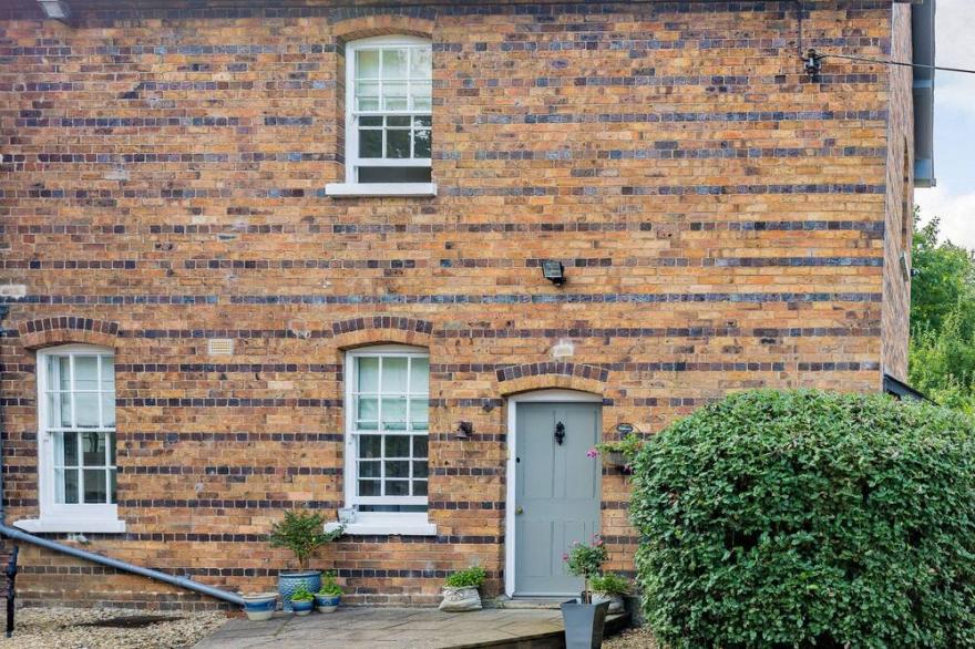 RIVERSIDE, with a garden in Stokesay