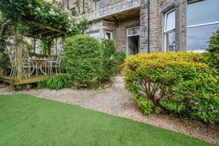 1 FLAXFORD HOUSE, pet friendly, with a garden in Grange-Over-Sands