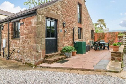 THE OLD BYRE, pet friendly, with open fire in Appleby-In-Westmorland