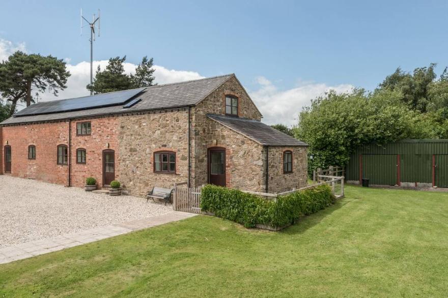 HOPE HALL BARN, pet friendly, with open fire in Hope, Shropshire