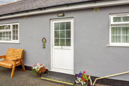 2 BLACK HORSE COTTAGES, pet friendly, with a garden in Pentraeth