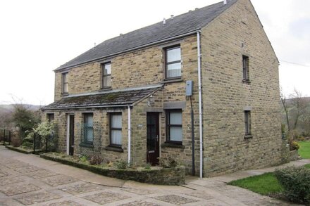 Beechcroft Cottage Reeth, set in two acres garden, river, ponds, amazing views