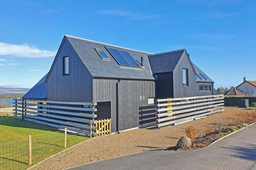 Spectacular uninterrupted views of Loch Fleet and the countryside from every room