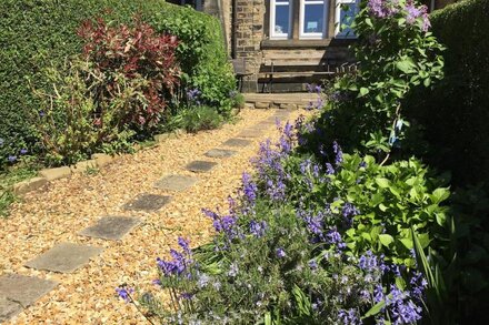 A beautifully presented 1650 cottage in Halifax with wonderful moorland views