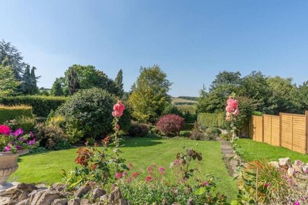 Built in the 1700s and conveniently situated next door to the local village pub, 1 Broughwood Cottag