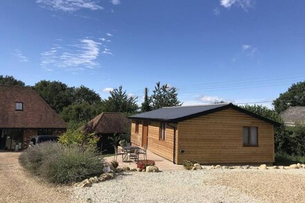 Keepers Retreat two bedroom log cabin situated on a working farm in Kent.