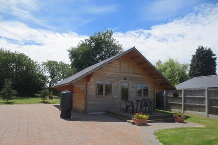 Idyllic Log Cabin in the garden of England