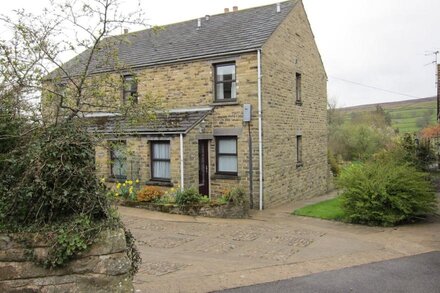 Cedarcroft Cottage Reeth, set in two acres of garden, river, ponds, amazing vie