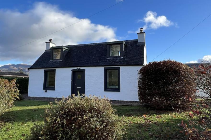 Stylishly renovated Croft house with uninterrupted views of fields, hills & sea