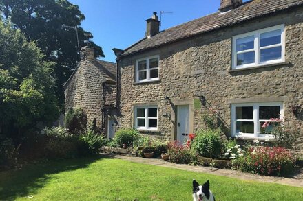 A Traditional Dales Cottage with log burning stove in the village of Romaldkirk.