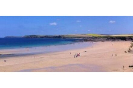 A Short Walk Down A Sandy Path To A Glorious Sandy Beach