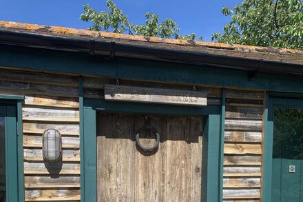 Authentic 1940's themed wooden cabin.