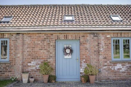 LaLo is a bright and airy barn conversion just outside the village of Pickhill with far reaching vie