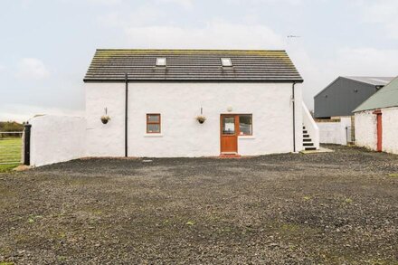 MAY'S COTTAGE, pet friendly in Bushmills, County Antrim