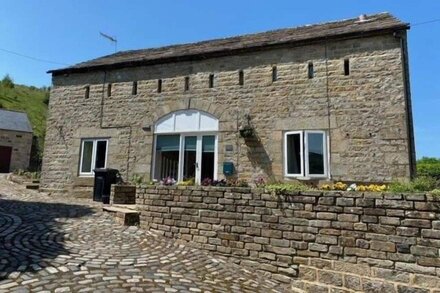 A spacious property with a focus on socialising with far reaching tranquil views of the dales