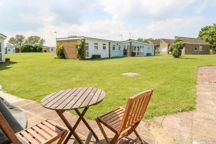 CHALET 150, pet friendly, country holiday cottage in Winterton-On-Sea