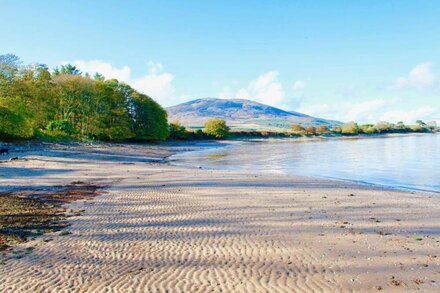 Curlew Lodge -  a fabulous and very comfortable beachside log chalet with stunning views and woodbur