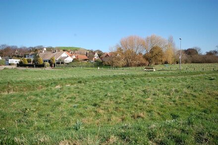 This delightful semi-detached cottage is close to walks,  bird watching & minutes from the beach.