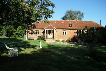 Converted stable in secluded rural setting.