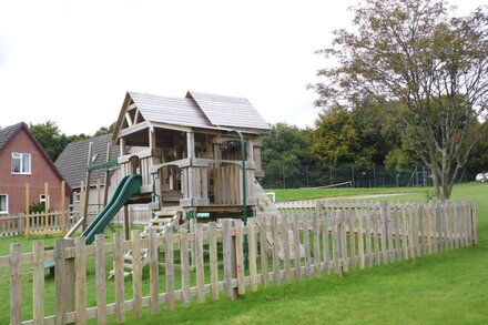 Large 3 bedroom lodge with its own fenced decking . Views over the country side.