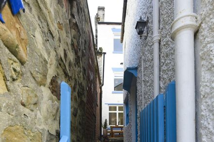 Large traditional house in the heart of old Staithes with outside courtyard.