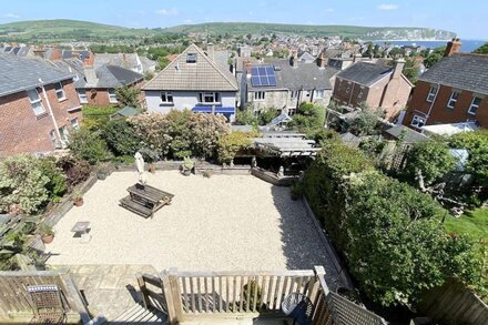 OUR LOVELY HOME WITH KITCHEN BALCONY WITH VIEWS OVER SWANAGE BAY/PURBECK  HILLS