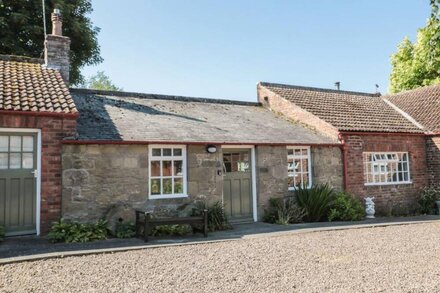 BAKERS COTTAGE, pet friendly, with a garden in Cornhill-On-Tweed