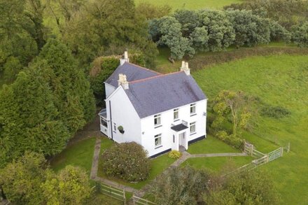 Traditional detached self-catering farmhouse with modern comforts.